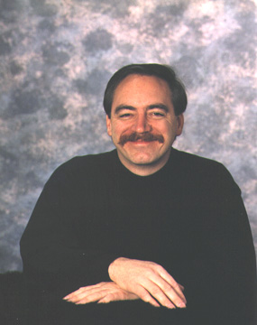 [Photo of James Chenevert]
